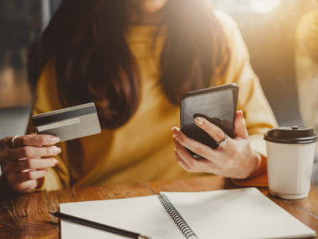 Woman manages her banking on mobile device